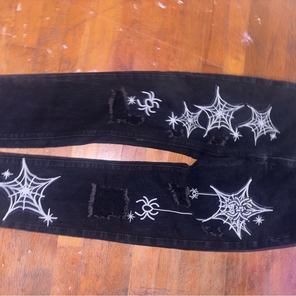 Black Jeans with White Spider Web Design